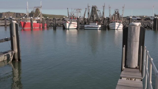 Fishing boats mooring in Coffs Harbour NSW Australia.Australia exported fisheries and aquaculture products valued at approximately US$912.14 million, with a 4% increase in value compared to 2020, focu