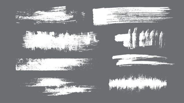 Black hand drawn brush stroke stripes with bold smears and textured grunge paint lines in calligraphy style