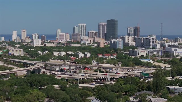 Aerial view Trucking left across Downtown St Petersburg, Florida Skyline Following an overpass exchange on Interstate 275 Vehicle Traffic
