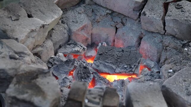 Hot coal with mild flames used for roasting in tandoor