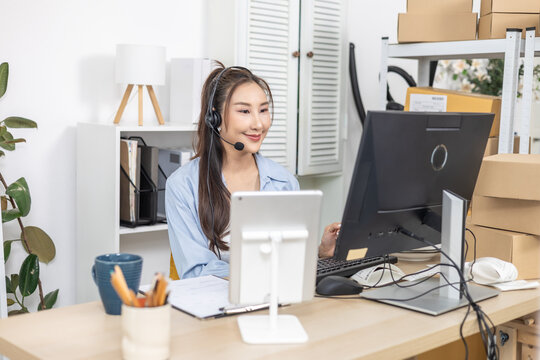 Customer, support, service, communication, ecommerce, cheerful small business owner talking to customer and showing ceramic products selling online by using social media from home business workspace.