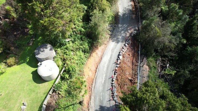 Under Slip caused by severe and extreme weather events in New Zealand island, destroying roads.