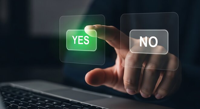 A hand hovering over a laptop keyboard with a glowing green yes button and a no button