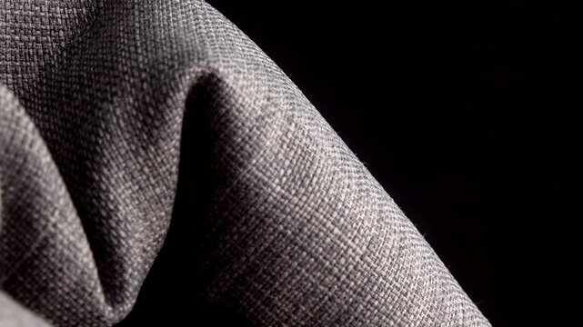 Grey tough fabric material close up rotating camera motion stock footage