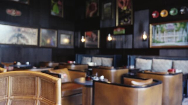 Dolly back from a marble edge to reveal a sophisticated hotel lounge featuring dark wood paneling, leather club chairs, and gallery wall under warm ambient lighting.