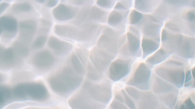 水面に広がる柔らかな波紋と抽象的な背景テクスチャ

