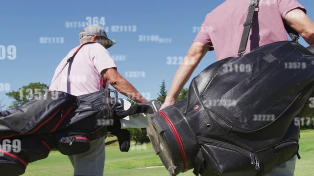 Two men carrying golf bags walking toward next hole, camera pulling back, numbers overlaying clubs