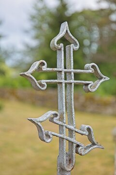 Old forged or wrought iron decorative cross, Muhu, Estonia, Europe.