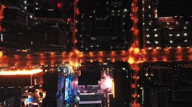 time lapse of traffic in modern city at night, aerial view