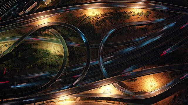time lapse of light trails on the highway, drone view