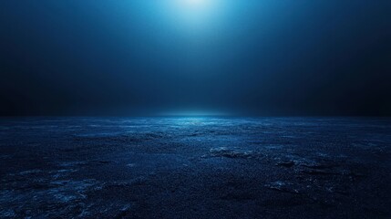 Fototapeta premium Mysterious Deep Blue Ocean Surface with Luminous Sunlight Breaking Through