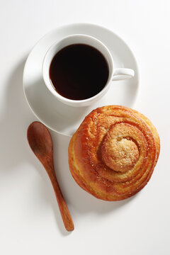 Black coffee and sweet bun
