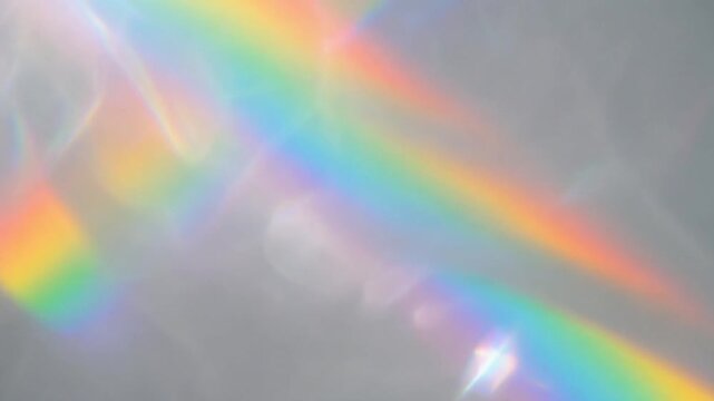 虹色の光が広がる柔らかいプリズム抽象背景グラデーションイメージ