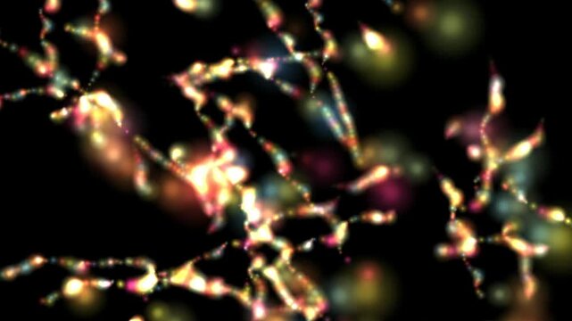 Abstract light particles float in deep black space