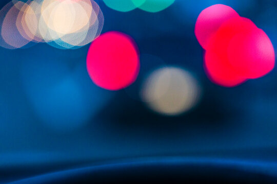 Blurred tail lights in urban road scene, Seattle, WA USA