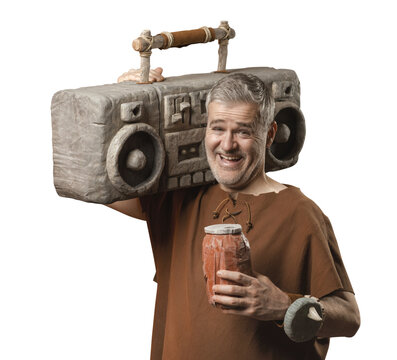 Cheerful Caveman Carrying Stone 80s Boombox on Shoulder, Holding