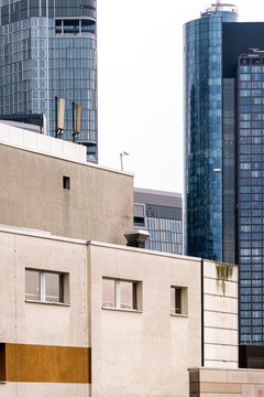 Modern city skyline buildings architecture with urban towers and facade detail for real estate development marketing showing growing construction district view