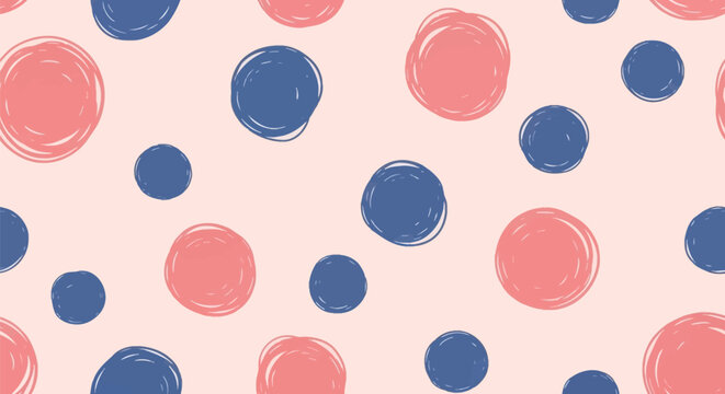 Seamless pattern featuring hand-drawn blue and pink scribbled polka dots on a light peach background. Abstract childish sketchy circles repeating background for textile and wallpaper.