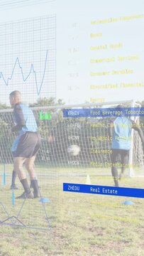 Vertical video: Man taking pass and dribbling cones for skill while finance chart overlay shifting