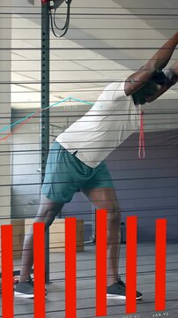 Vertical video: Man leaning on rig then walking, causing rising fitness overlays while warming up