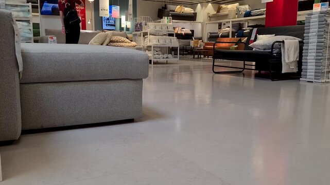 Woman Customer Shopping at IKEA Furniture Store, Interior Static Shot