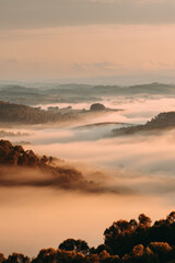 Naklejka premium stunning salt lake in kazakhstan enveloped in mist and fog rich color tones at sunset