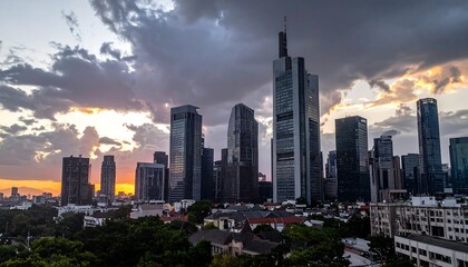 Fototapeta premium Cityscape with Skyscrapers at Dramatic Sunset.