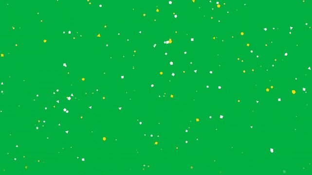 A vibrant green background scattered with multicolored dots resembling tiny stars or confetti
