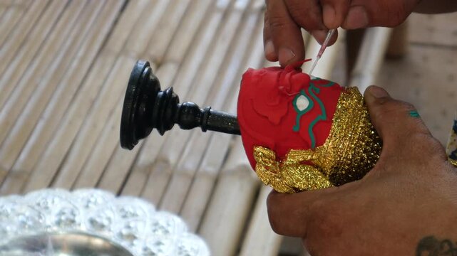 Craft of painting Khon characters, Thailand