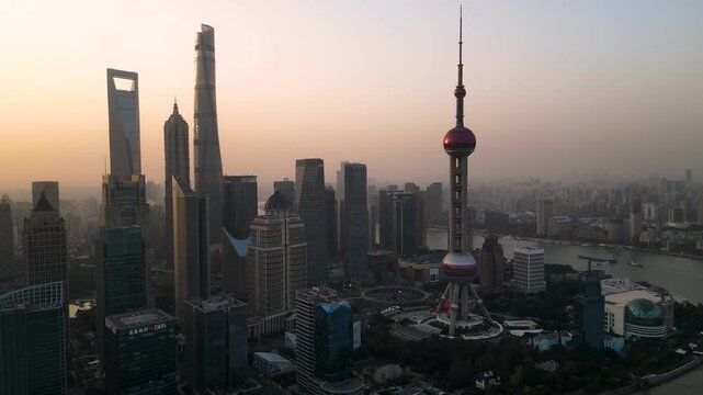 The skyscraper of Oriental Pearl TV Tower in Pudong landmarks is a district of Shanghai, China, located east of the Huangpu River across from the historic city.