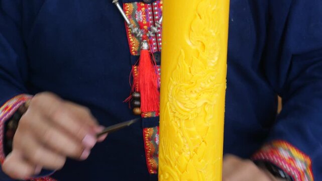 Carving candle in Thailand