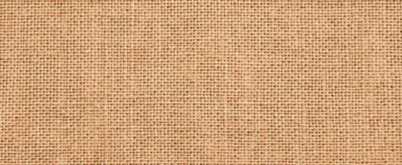 Fototapeta premium Canvas fabric texture like a cozy sweater in beige for graphic design and crafts.