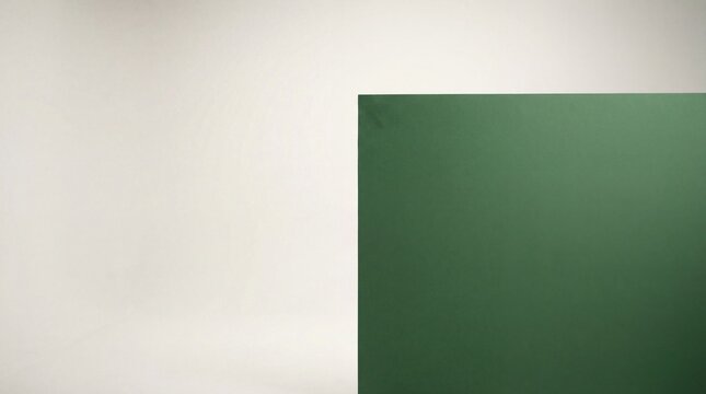 Minimalist studio backdrop with clean white space and green screen panel