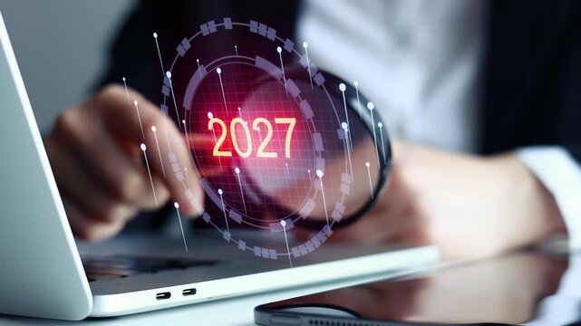 Future planning for 2027 with technology and business on a laptop in an office setting.