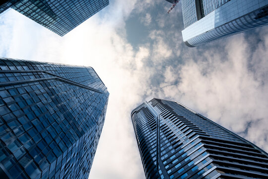 Urban Frankfurt Bankenviertel skyscraper and financial architecture rendered in glass with dramatic perspective to sky creating clean copyspace