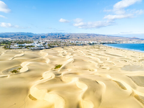 Dunas de Maspalomas sand dunes desert on Gran Canaria island aerial view photo from above holidays in Spain