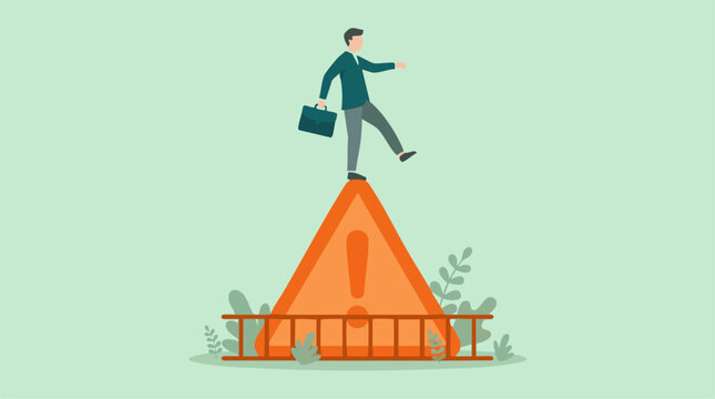 Businessman balancing on a warning sign, representing business risk and challenge