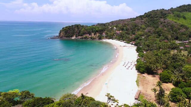 Fly over dense greenery to Klong Jak beach, Koh Lanta