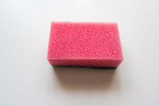 Pink cleaning sponge isolated on surface