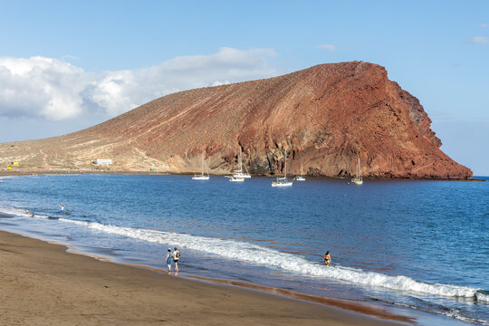 Playa de la Tejita beach with Montana Roja mountain sea vacation on Tenerife island in Spain