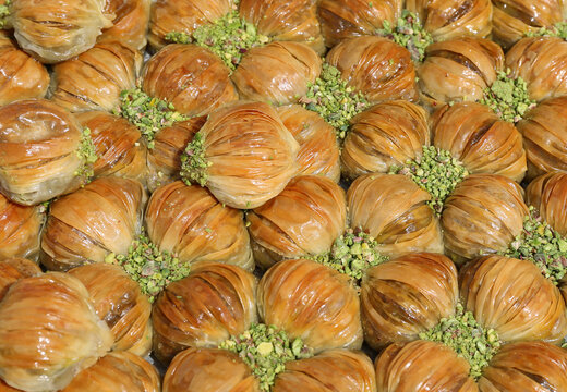 Midye Baklava aka Traditional Mussel shaped Baklava with Pistachios for Sale at The Orange Blossom Festival in Adana, Turkey