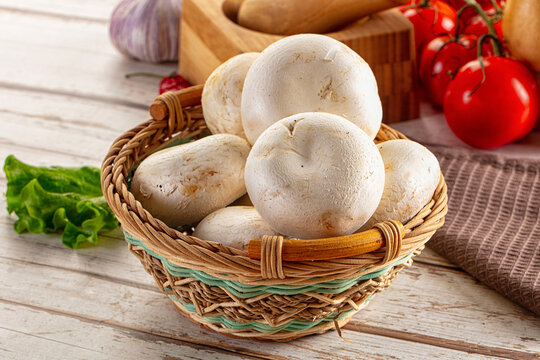 Raw white champignon mush heap