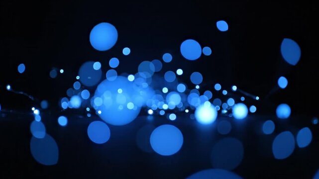 A mesmerizing display of blue glowing orbs.