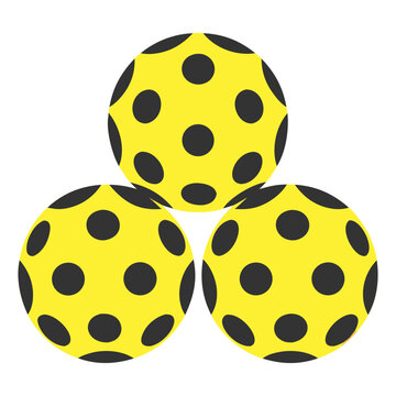 Three pickleballs with holes on white background