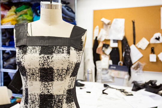 Garment on dress form in fashion studio
