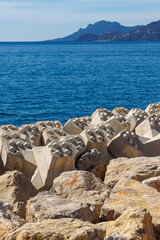 Fototapeta premium Concrete breakwater blocks on Cannes coastline