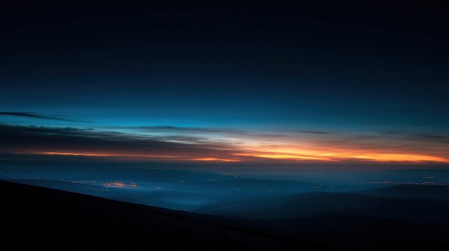 predawn. Golden rays of dawn breaking over the horizon into a deep blue pre-dawn sky. travel magazines, destination branding, designed for outdoor magazines and nature guides, used by ux designers.