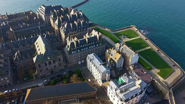 Bastion de la Hollande and historic ramparts surrounding old town of Saint-Malo in Brittany, France. Aerial backward