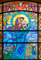 Fototapeta premium Salerno - The Madonna in stained glass of church Chiesa della Santissima Annunziata designed by Giuseppe Turri and made by Antonio Perotti