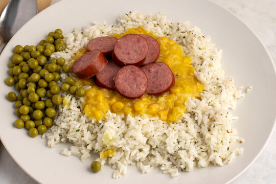 kielbasa   with rice, crem corn and peas